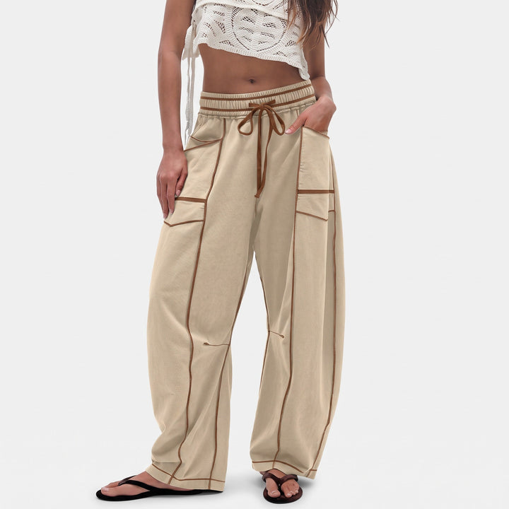 Jogging femme large oversize, jambe tonneau et poches à rabat