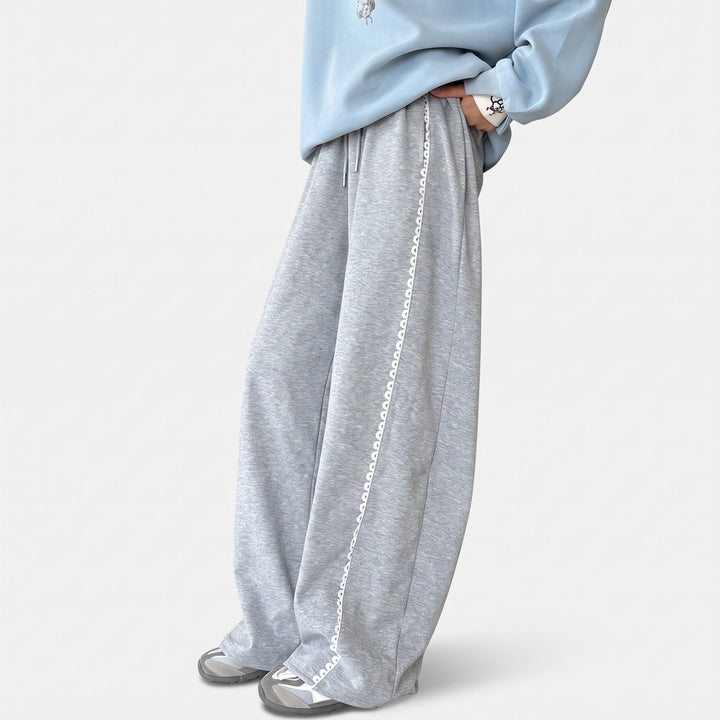 Jogging femme large baggy, dentelle festonnée aux coutures et à l'ourlet