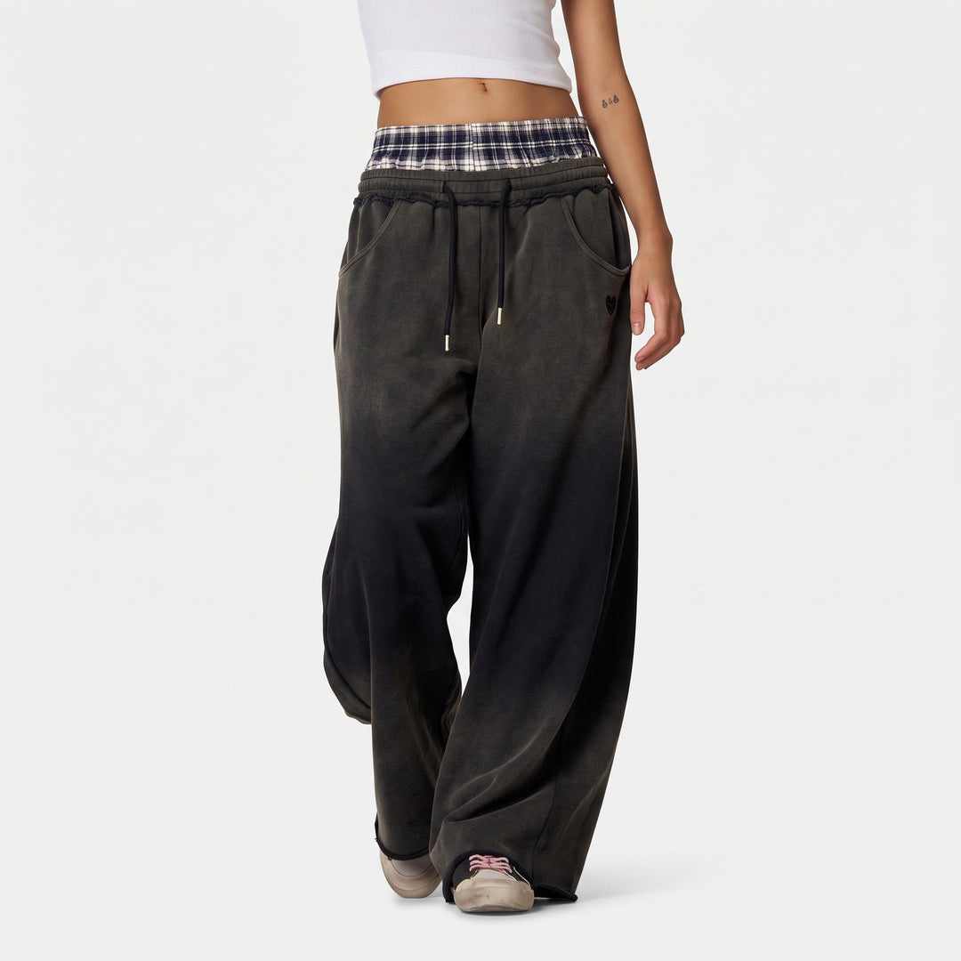 Jogging femme large oversize, ceinture boxer à carreaux et bas brut
