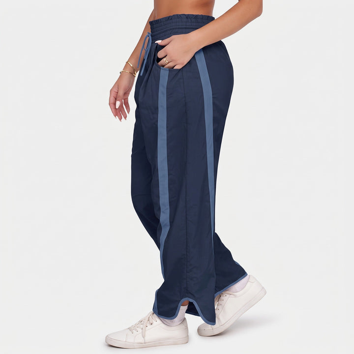 Jogging femme large oversize baggy, bas fendu passepoilé et taille volantée