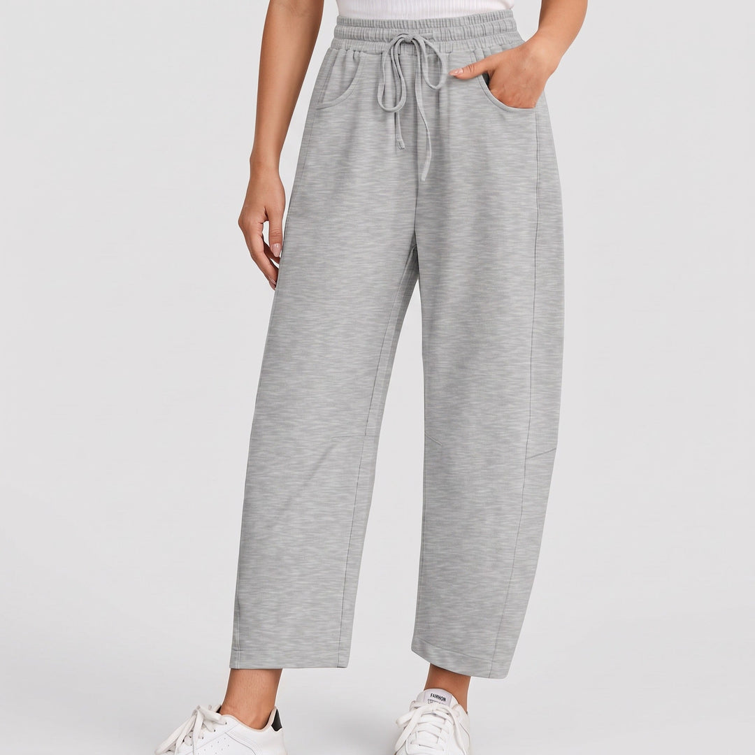 Jogging femme large baggy, jambe tonneau courte et couture au genou