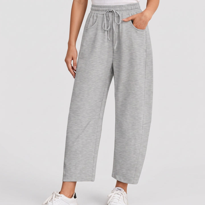 Jogging femme large baggy, jambe tonneau courte et couture au genou
