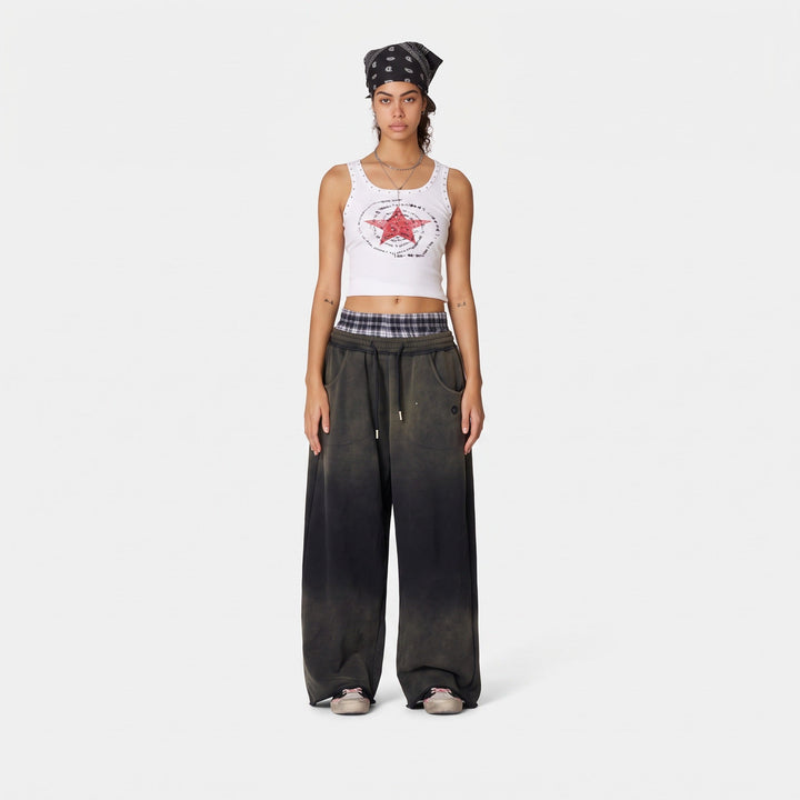 Jogging femme large oversize, ceinture boxer à carreaux et bas brut