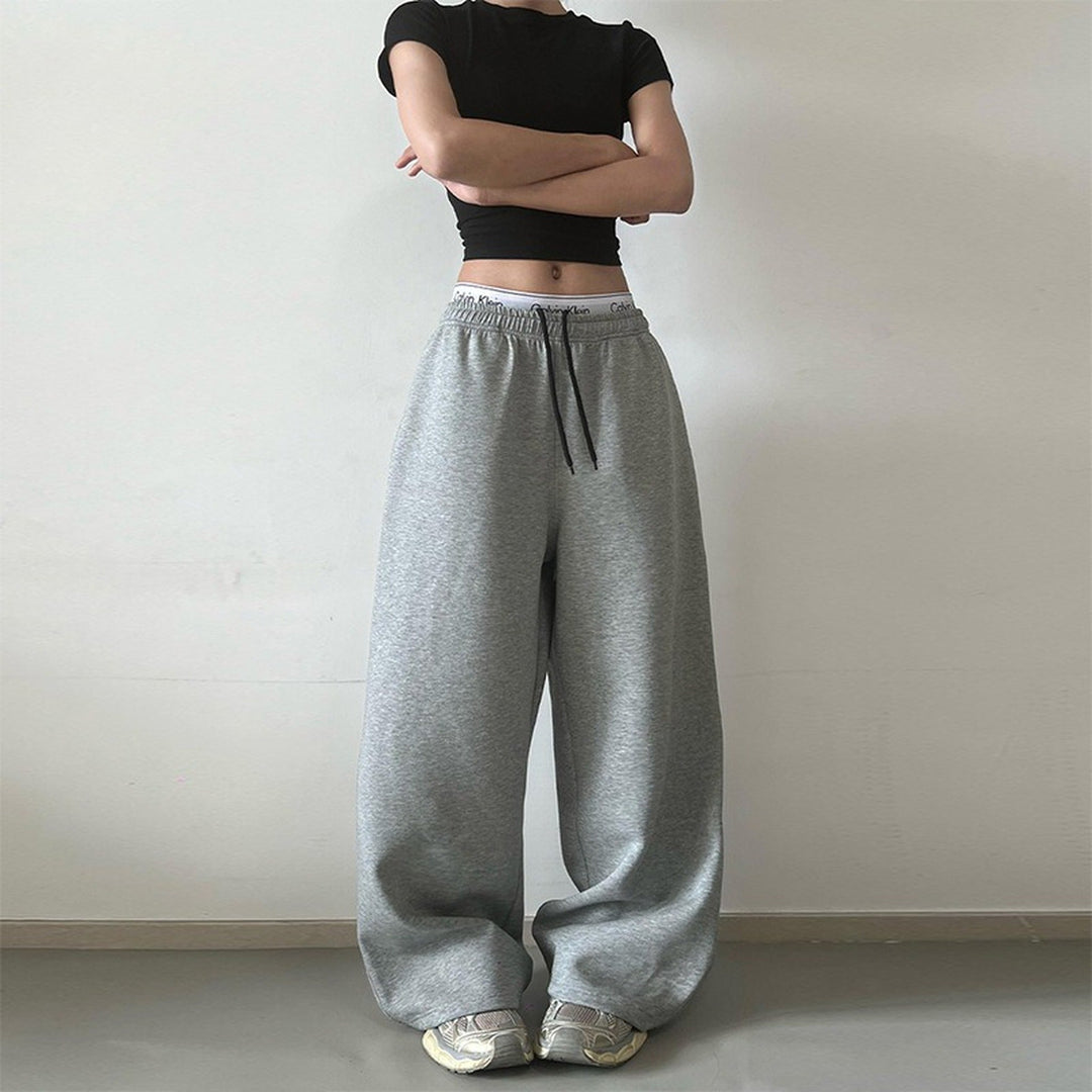 Jogging femme large oversize, double ceinture basse et cordon contrasté