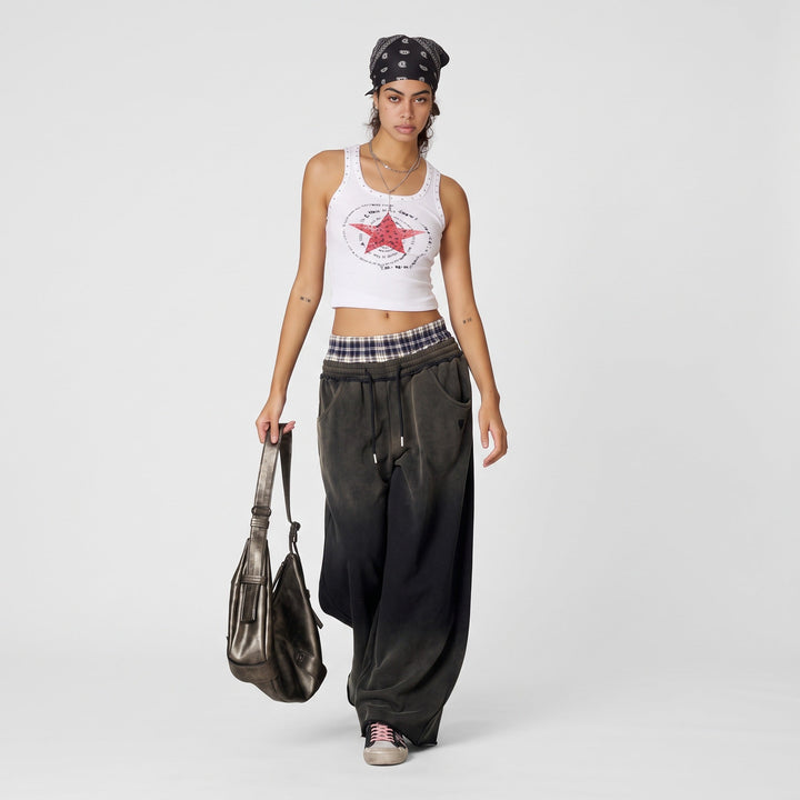 Jogging femme large oversize, ceinture boxer à carreaux et bas brut
